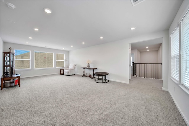 sitting room with light colored carpet