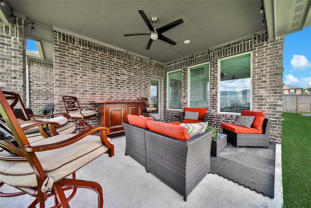 view of patio featuring ceiling fan