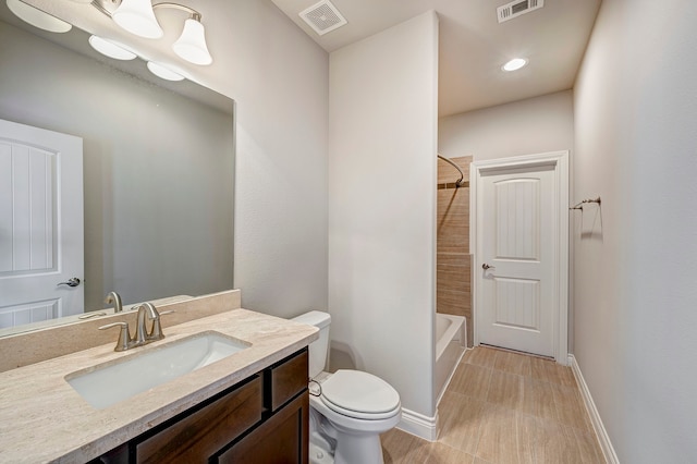 full bathroom featuring shower / bathing tub combination, vanity, and toilet