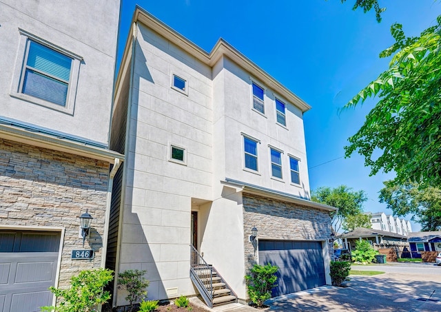 view of front of home with a garage