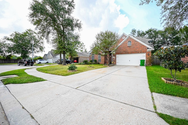 view of front of property with a garage and a front yard