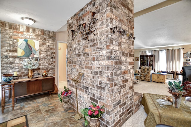 interior space with a textured ceiling and carpet