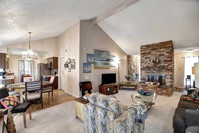 living room with beamed ceiling, a brick fireplace, a textured ceiling, light colored carpet, and a notable chandelier