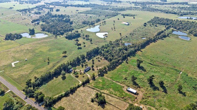 aerial view featuring a water view and a rural view