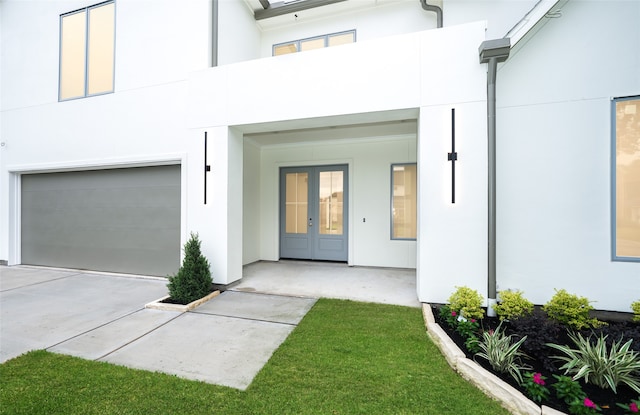 view of exterior entry featuring a garage