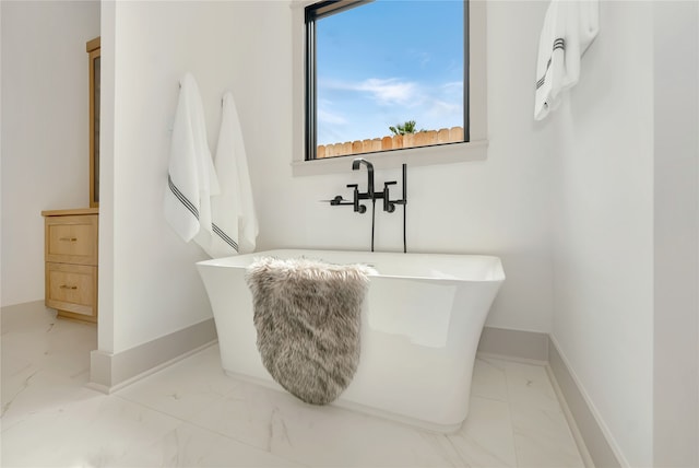 bathroom featuring a bath