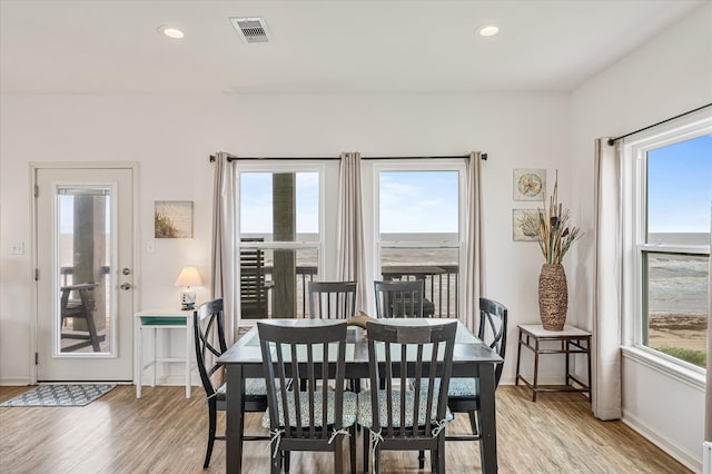 dining space featuring light hardwood / wood-style floors