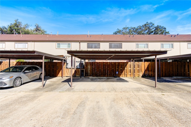 rear view of house with a carport