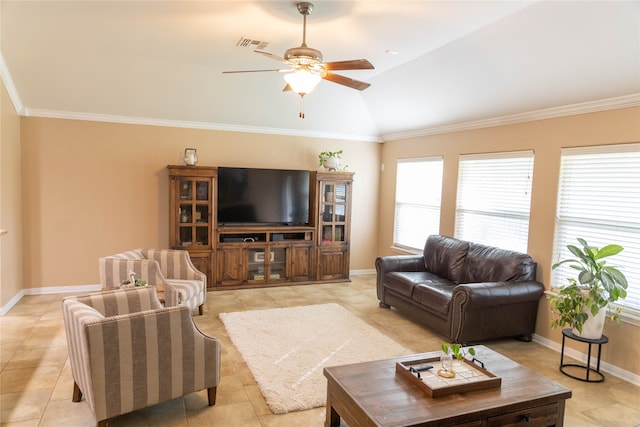 tiled living room with ceiling fan, ornamental molding, and vaulted ceiling