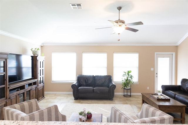 living room with ceiling fan, light tile patterned flooring, and crown molding