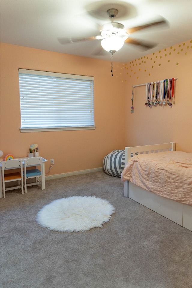 unfurnished bedroom with carpet flooring and ceiling fan