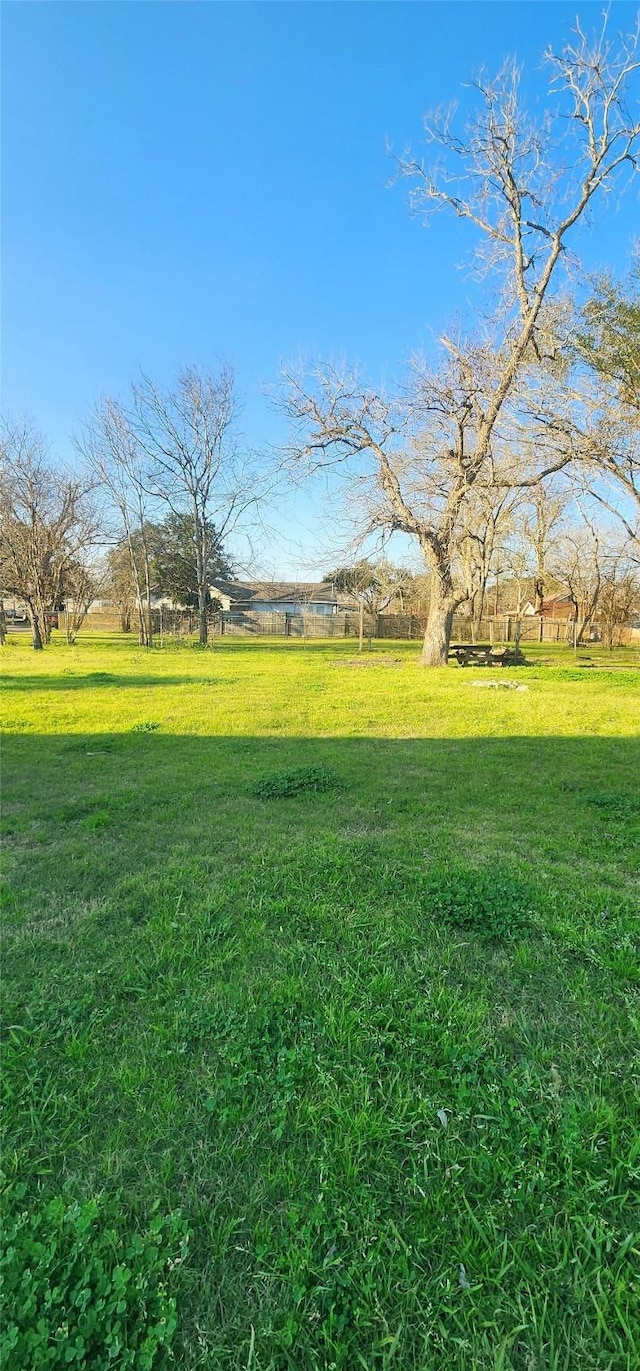 view of yard with a rural view