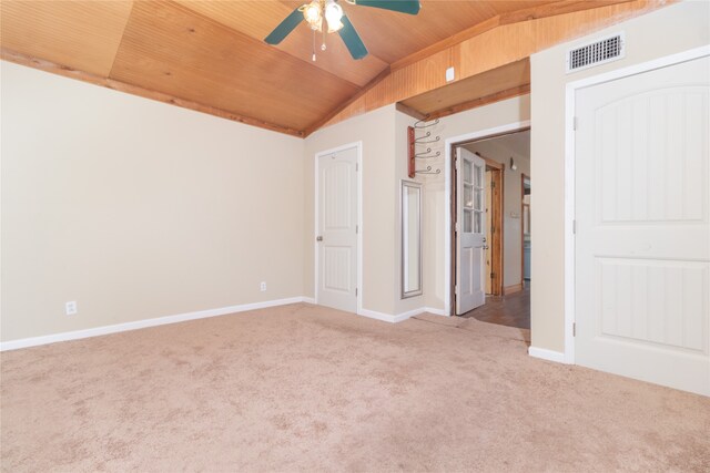 interior space featuring light carpet, wood ceiling, lofted ceiling, and ceiling fan