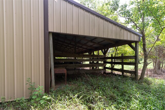 view of property's community featuring an outbuilding