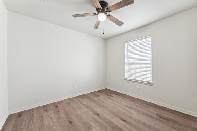 unfurnished room with light hardwood / wood-style floors and ceiling fan