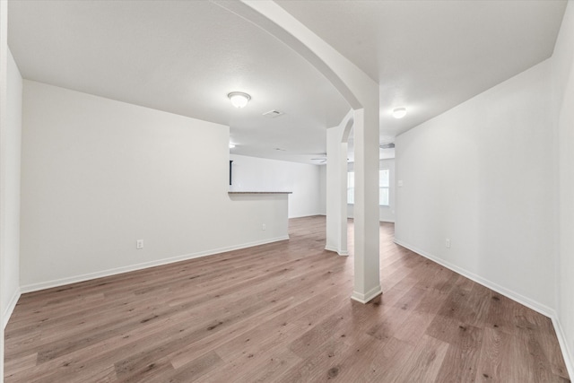 basement featuring light hardwood / wood-style floors