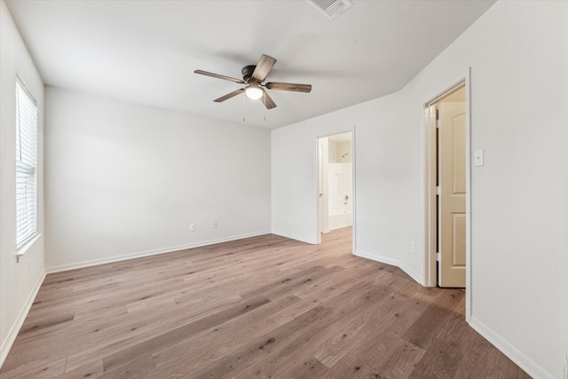 unfurnished room with light hardwood / wood-style flooring and ceiling fan