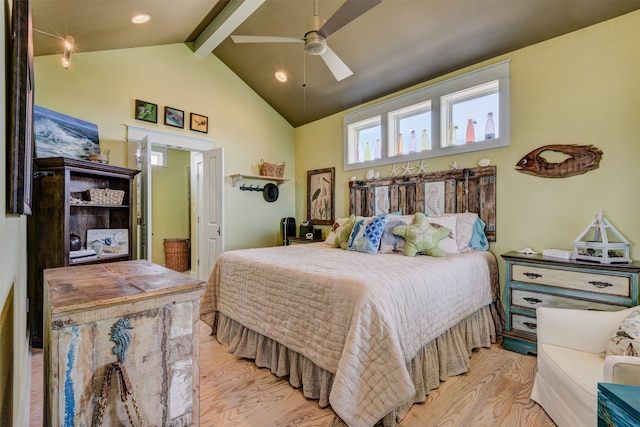 bedroom featuring vaulted ceiling with beams, ceiling fan, and light wood-type flooring