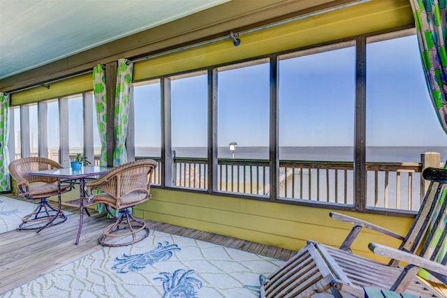 sunroom with a water view