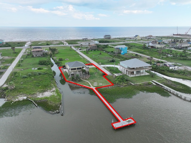 1038 Elizabeth St, Gilchrist, TX 77617 - aerial view of property's location with a nearby body of water and property parcel outlined