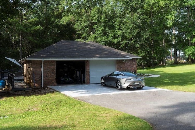 garage with a lawn