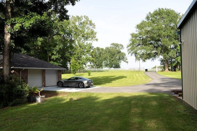 view of yard with a garage