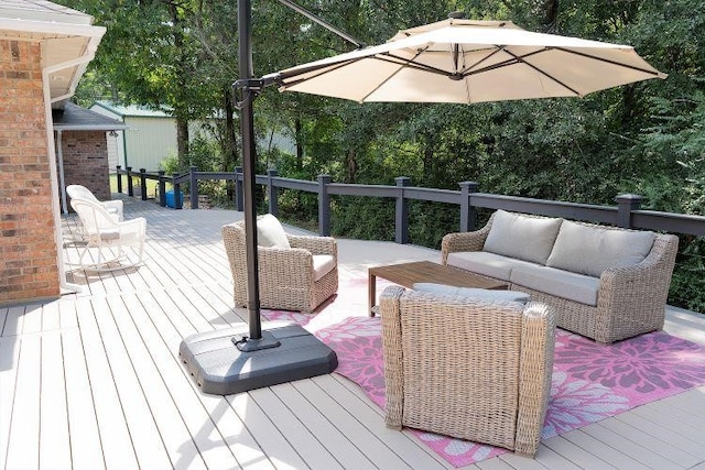 wooden terrace featuring an outdoor hangout area