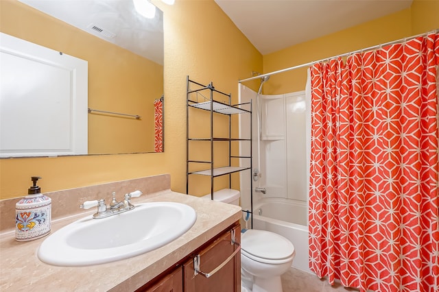 full bathroom featuring shower / bathtub combination with curtain, vanity, and toilet