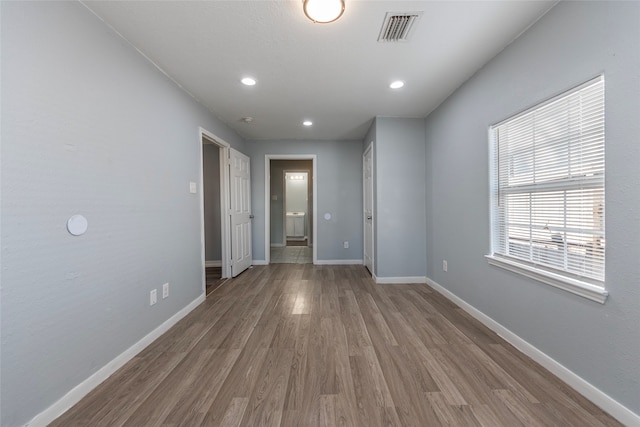 empty room with light wood-type flooring