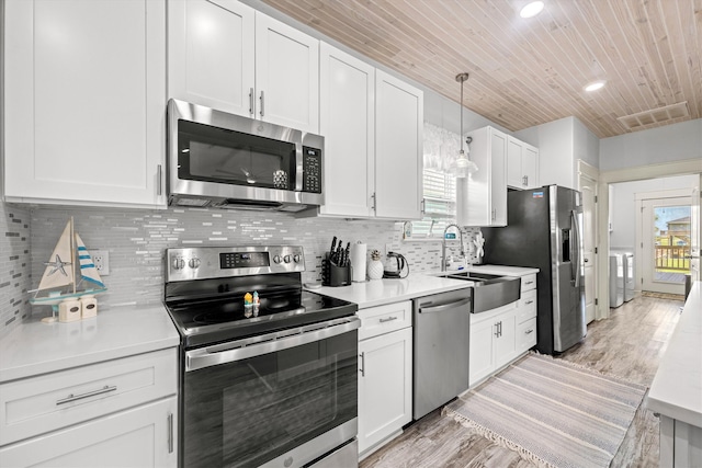 kitchen featuring wooden ceiling, stainless steel appliances, light hardwood / wood-style flooring, and white cabinets