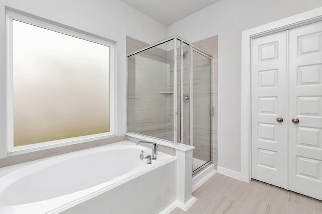 bathroom with plus walk in shower