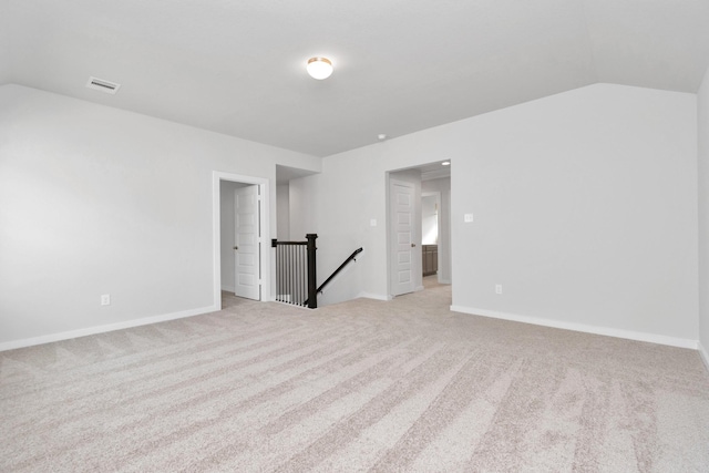 19726 Vino Vale Dr, Hockley, TX 77447 - unfurnished room featuring vaulted ceiling, light carpet, and baseboards