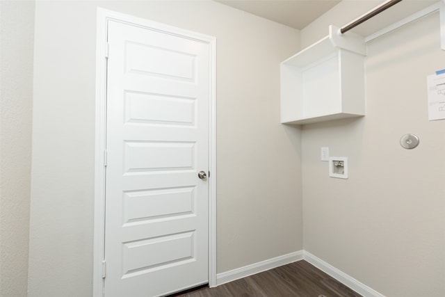 laundry room with dark hardwood / wood-style flooring and washer hookup