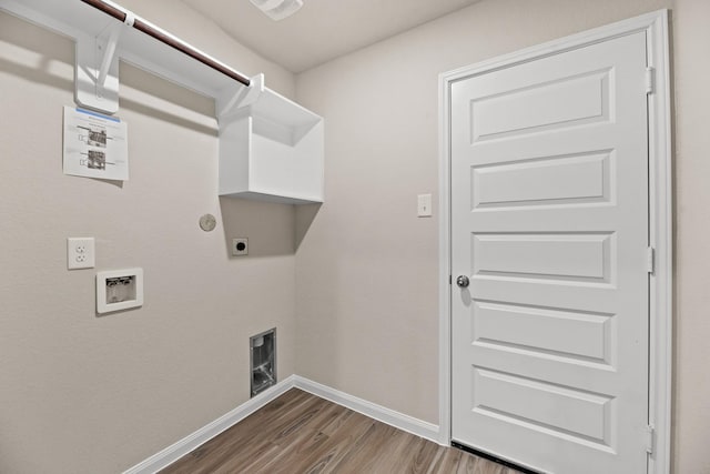 washroom featuring hookup for an electric dryer, hookup for a washing machine, and hardwood / wood-style flooring