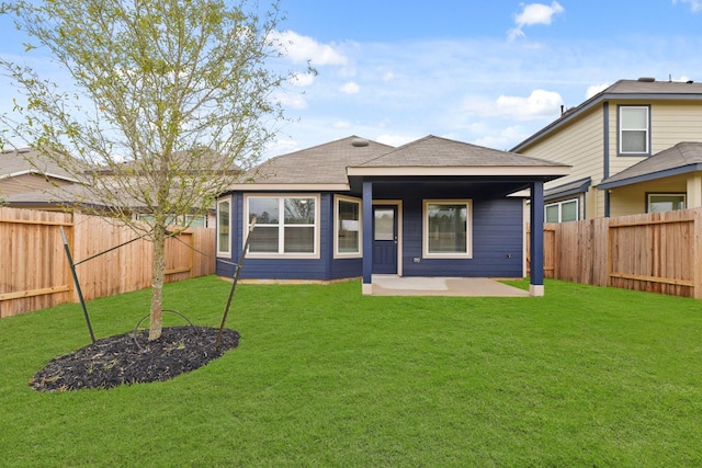 view of front of home with a patio area and a front lawn