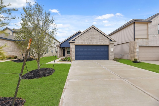 view of front of home with a garage and a front lawn