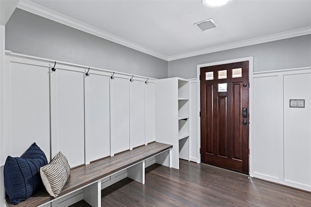 mudroom featuring dark wood-type flooring and crown molding