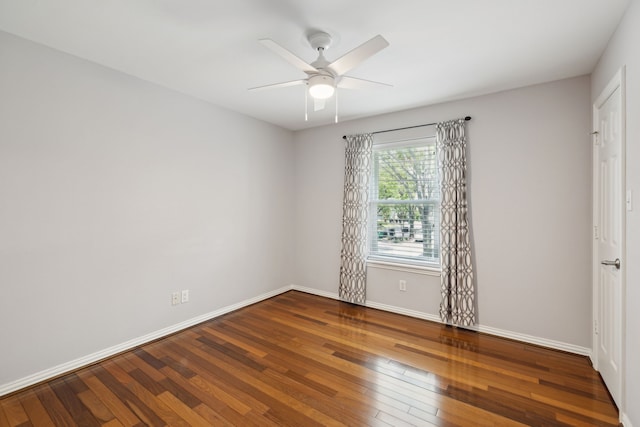 empty room with wood-type flooring and ceiling fan