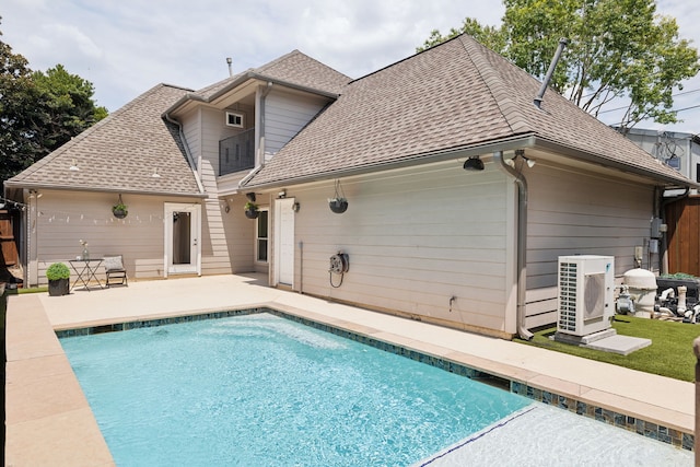 back of house featuring a patio area and ac unit