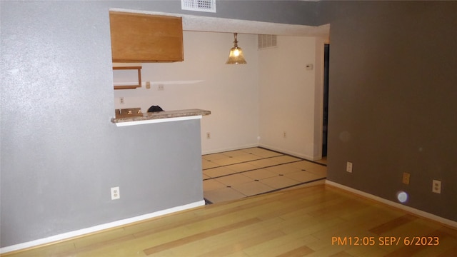 empty room featuring hardwood / wood-style floors