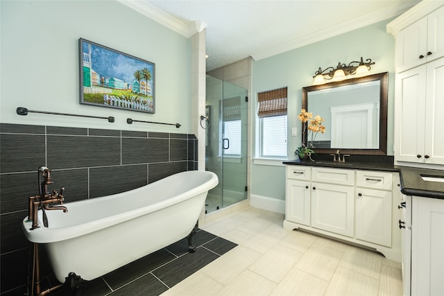 full bathroom featuring tile walls, a soaking tub, crown molding, vanity, and a stall shower