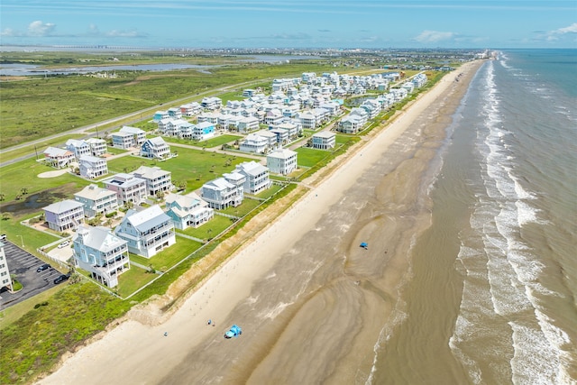aerial view with a beach view and a water view