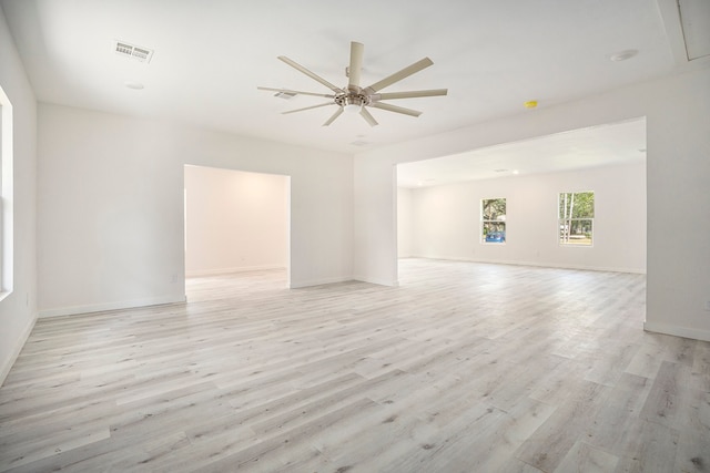 empty room featuring light hardwood / wood-style floors and ceiling fan