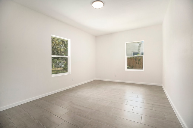 empty room featuring wood-type flooring