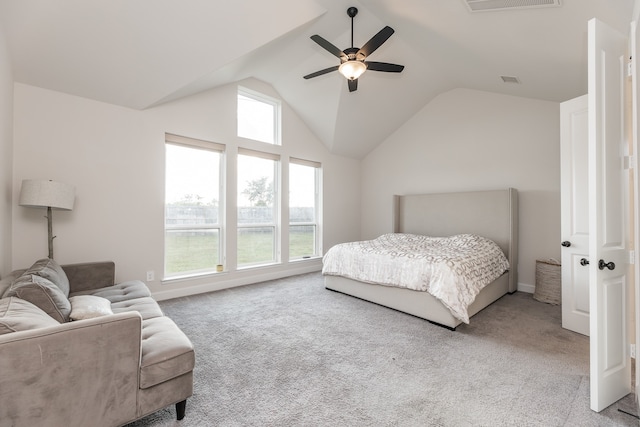 bedroom with ceiling fan, carpet, and vaulted ceiling