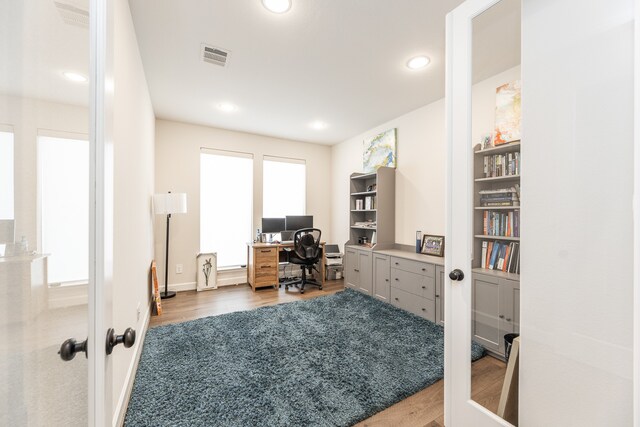 office area with dark wood-type flooring