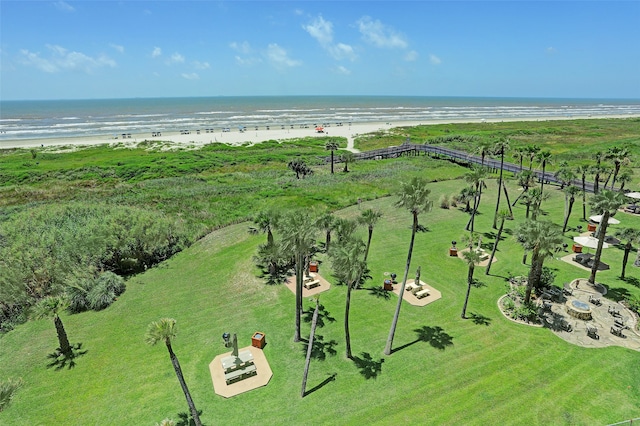 aerial view featuring a water view and a beach view