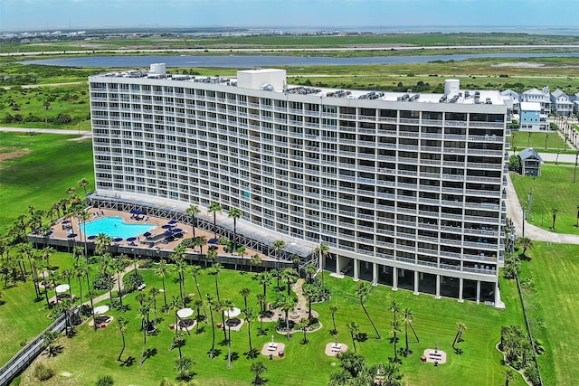 birds eye view of property with a water view