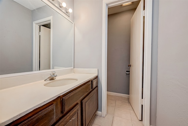 bathroom featuring vanity and tile patterned floors