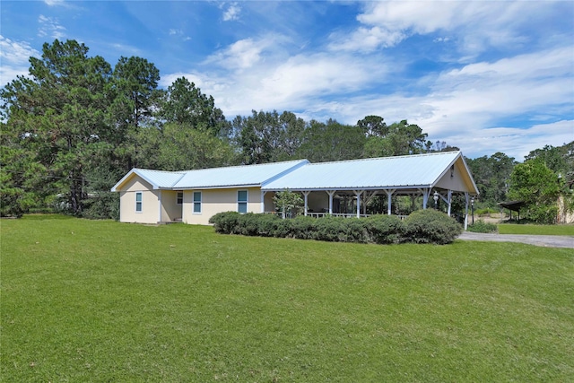 ranch-style house with a front lawn